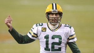 Green Bay Packers quarterback Aaron Rodgers (12) in action during the first half of an NFL football game against the Chicago Bears, Sunday, Jan. 3, 2021, in Chicago.