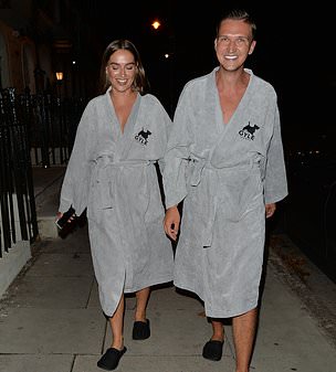 Here they come: The Only Way Is Essex star Chloe Ross and close friend Chris Kowalski wore matching hotel robes as the ventured out for late night snacks from a local shop on Monday evening