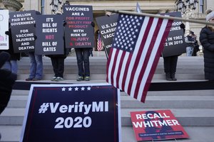 President Trump supporters rally at the Capitol building in Lansing, Mich., Saturday, Nov. 14, 2020