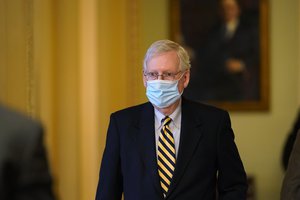 Senate Minority Leader Mitch McConnell of Ky., walk back to his office on Capitol Hill in Washington, Monday, Jan. 25, 2021.