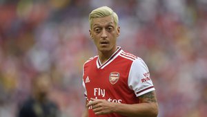 Arsenal midfielder Mesut Ozil stands on the field during the first half of an International Champions Cup soccer match against Real Madrid, Tuesday, July 23, 2019, in Landover, Md.