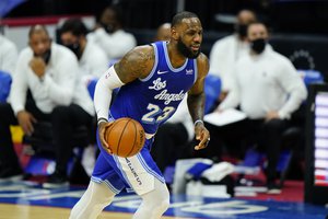 Los Angeles Lakers' LeBron James plays during an NBA basketball game against the Philadelphia 76ers, Wednesday, Jan. 27, 2021, in Philadelphia