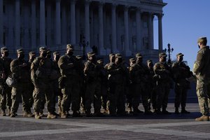 National Guard troops reinforce the security zone on Capitol Hill in Washington, Tuesday, Jan. 19, 2021, before President-elect Joe Biden is sworn in as the 46th president on Wednesday.