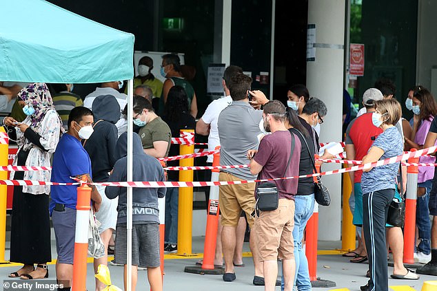 Vital QR codes for checking into cafes and restaurants were only made mandatory two weeks ago, while people have reported waiting up to six hours to get covid tests. Pictured is a long wait in Brisbane on Friday