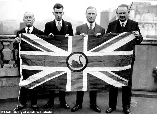 The four secessionist delegates holding the proposed flag for Western Australia, on the roof of the Savoy House in London in October 1934