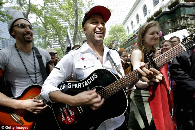 In tune with the activists: Tom Morello from rock band Rage Against the Machine marches with activists