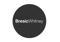 Black circle with 'Bresic Whitney' written in it