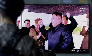 A South Korean army soldier watches a TV screen showing a local news program reporting about North Korea's missile launch, at the Seoul Railway Station in Seoul, South Korea, Saturday, Sept. 16, 2017. North Korea leader Kim Jong-un