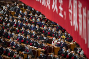 AP Week in Pictures Asia Attendees wearing face masks watch an event to honor some of those involved in China's fight against COVID-19 at the Great Hall of the People in Beijing, Tuesday, Sept. 8, 2020.