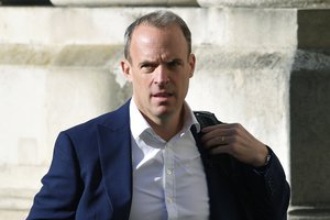 FILE - In this Tursday, Sept. 1, 2020 file photo, Britain's Foreign Secretary Dominic Raab arrives to attend a cabinet meeting of senior government ministers at the Foreign and Commonwealth Office FCO in London.