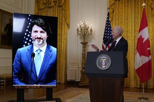 President Joe Biden speaks after holding a virtual meeting with Canadian Prime Minister Justin Trudeau, in the East Room of the White House, Tuesday, Feb. 23, 2021, in Washington. (AP Photo/Evan Vucci)