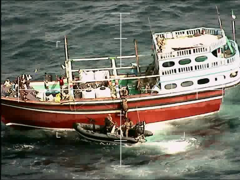 Royal Marines board a drugs-running craft in the Arabian Sea