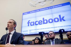 In this Oct. 23, 2019, file photo, Facebook CEO Mark Zuckerberg testifies before a House Financial Services Committee hearing on Capitol Hill in Washington