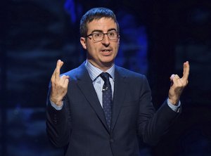 FILE - In this Feb. 28, 2015 file photo, John Oliver speaks at Comedy Central's "Night of Too Many Stars: America Comes Together for Autism Programs" in New York.