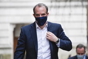 Britain’s Foreign Secretary Dominic Raab wears a face mask as he arrives at 10 Downing Street, in London, Wednesday, Feb. 3, 2021.(AP Photo/Alberto Pezzali)