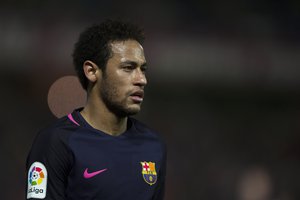 FC Barcelona's Neymar da Silva from Brazil gestures against Granada during their Spanish La Liga soccer match in Granada, Spain, Sunday April 2, 2017.