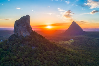 Aerial view of Mount Coonowrin in the Glasshouse National Park with Mount Beerwah in the background with the setting sun in background,Glasshouse Mountains,Sunshine Coast,Queensland,Australia traxxcoverhinterland
Getty Images, downloaded as comps; if used will need to download from Getty. one time use Traveller only