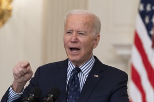 President Joe Biden speaks in the State Dining Room of the White House, Saturday, March 6, 2021, in Washington. (AP Photo/Alex Brandon)