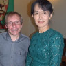 Sean Turnell, left, has long provided advice to Myanmar’s elected leader Aung San Suu Kyi, right. 