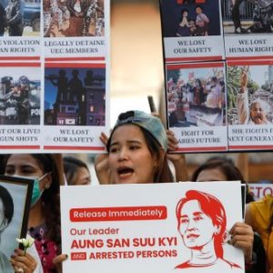 Myanmar citizens hold placards in front of the United Nations building during the demonstration. Protesters gathered in front of the United Nations building to protest against the military coup and demanded the release of Aung San Suu Kyi. Myanmar's military detained State Counsellor of Myanmar Aung San Suu Kyi on February 01, 2021 and declared a state of emergency while seizing the power in the country for a year after losing the election against the National League for Democracy (NLD). (Photo by Chaiwat S