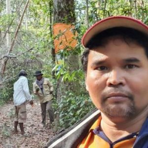 Ouch Leng in Prey Lang Forest, pictured in February 2021, protecting resin trees prior to his arrest.