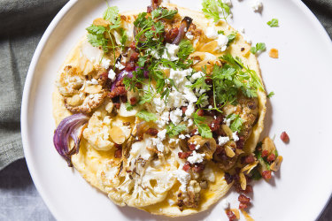 Karen Martini's spiced cauliflower and feta omelette with chorizo dressing recipe.