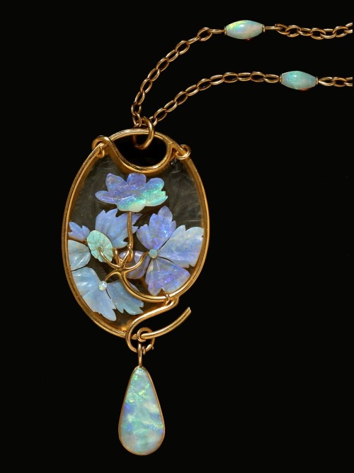 cairparavel:
Opal and glass gold-mounted pendant by Ren Lalique, c. 1900.
