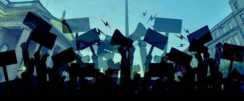 Independent Left is a new movement for Irish socialists. Environmentalism, socialism, freedom and equality. #liveablecity. Its members include Councillor John Lyons, Niamh McDonald and Conor Kostick. The image is a blue-tinted background of the GPO, O'Connell Street, with the silhouettes of demonstrators waving placards in the foreground.