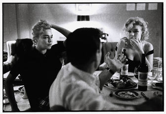 Simone Signoret, Yves Montand, and Marilyn Monroe at a Beverly Hills Hotel. Beverly Hills, California, USA