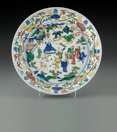 A Chinese Wucai 'Eight Immortals' Dish, Ming Dynasty, Wanli Period