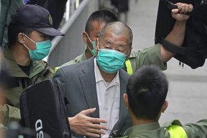 In this Feb. 9, 2021, file photo, democracy advocate Jimmy Lai leaves the Hong Kong's Court of Final Appeal in Hong Kong. Prominent Hong Kong democracy advocate and newspaper publisher Lai returned to court to relaunch his appeal for bail on Thursday, Feb. 18, 2021 ahead of his April trial on charges of colluding with foreign forces.