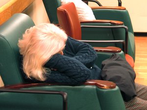 In this Sept. 20, 2012 photo, a dementia patient naps at the Hebrew Home at Riverdale in the Bronx borough of New York.