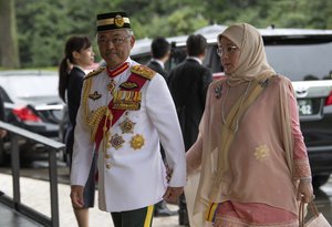 King Sultan Abdullah Sultan Ahmad Shah and Queen Tunku Azizah Aminah Maimunah of Malaysia arrive to attend the enthronement ceremony of Emperor Naruhito at the Imperial Palace on Tuesday, Oct. 22, 2019