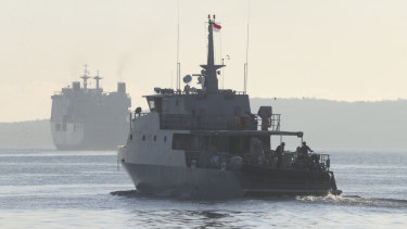 An Indonesian navy patrol ship sails to join the search for submarine KRI Nanggala that went missing while participating in a training exercise on Wednesday, off Banyuwangi, East Java, Indonesia, Saturday, April 24, 2021. The KRI Nanggala 402 went missing after its last reported dive Wednesday off the resort island, and concern is mounting it may have sunk too deep to reach or recover in time. (AP Photo/Achmad Ibrahim)