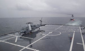 STRAIT OF MALACCA (March 27, 2017) An MQ-8B Fire Scout unmanned helicopter approaches the littoral combat ship USS Coronado (LCS 4) for landing