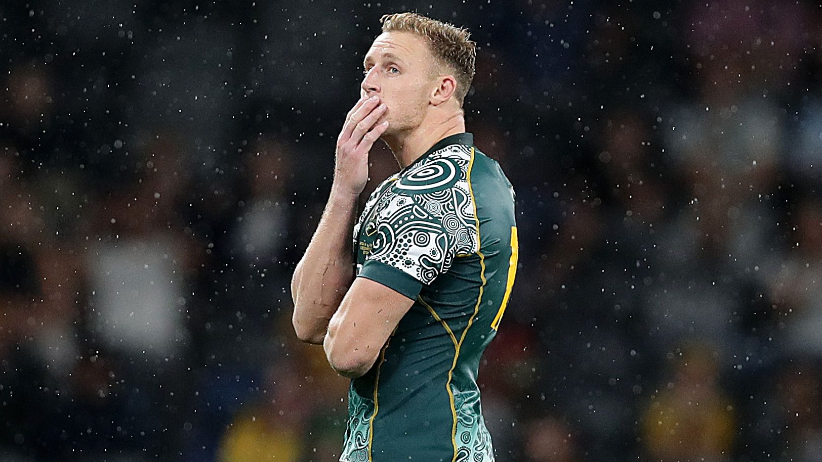 Reece Hodge of the Wallabies reacts after missing a late kick at goal.