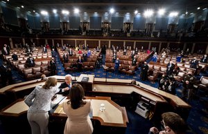 President Joe Biden elbow bumps with House Speaker Nancy Pelosi of Calif., left, as he arrives to address a joint session of Congress, Wednesday, April 28, 2021, in the House Chamber at the U.S. Capitol in Washington. Vice President Kamala Harris stands and applauds.