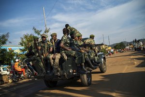 File - In this photograph taken Tuesday 16 July 2019,  Congolese soldiers patrol the streets of  Beni, Congo DRC, the epicenter of the current Ebola epidemic.