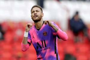 PSG's Neymar celebrates after scoring his side's first goal during the French League One soccer match between Paris Saint-Germain and Lens at the Parc des Princes stadium in Paris, France, Saturday, May 1, 2021.