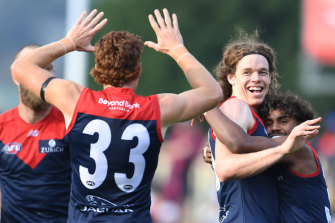 Demons forward Ben Brown celebrates a goal during the round seven match against his former side, the Kangaroos.