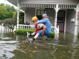 File - Texas National Guard Soldiers conduct rescue operations in flooded areas around Houston, Texas, Aug. 27, 2017. National Guard officials are looking to posture 20,000 to 30,000 more Guardsmen to be ready to support hurricane relief efforts if needed.