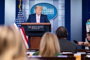 Donald J. Trump listens to a reporter’s question during the coronavirus update briefing