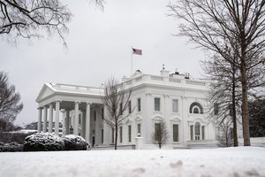 In this Feb. 1, 2021, photo, snow covers the ground at the White House in Washington.