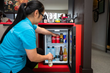 Ovolo Hotel at Woolloomooloo has a different approach to minibars in that they provide items, called “the perks”, free-of-charge (or in reality built into the rate) such as sweets, chips and soft drinks rather than charging per item. Story: Minibars are profit loss leaders for most hotels with COVID-19 giving  general managers an excuse to either finally get rid of them or destock. 7th May 2021 Photo: Edwina Pickles / SMH