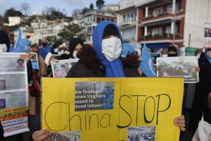 File - Members of the Uighur community living in Turkey, hold a protest near China's consulate in Istanbul, Wednesday, Feb. 10, 2021. More than a million Uighurs and other largely Muslim minorities have been swept into prisons and detention camps in China, in what China calls an anti-terrorism measure.