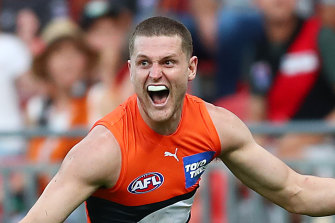 Jacob Hopper celebrates kicking a late goal for the Giants.