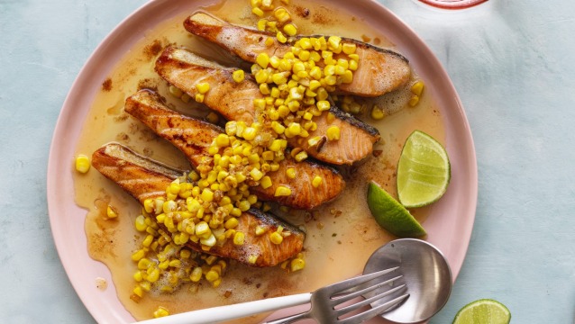 Salmon fillets with buttered garlic corn.