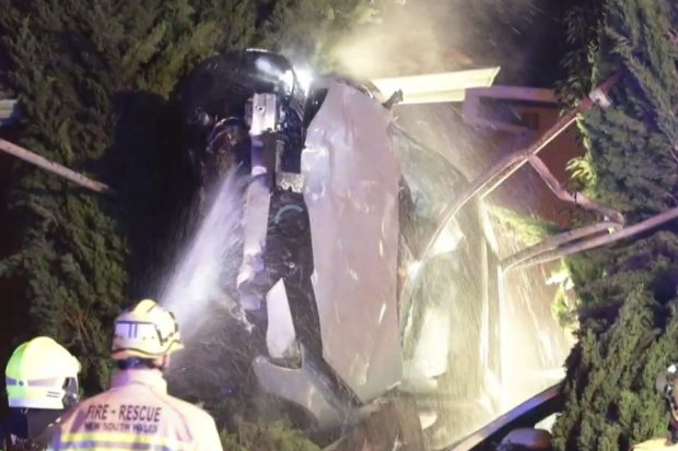 Witnesses have described hearing an explosion like a bomb going off after a car became airborne and catapulted towards a home in Sydney’s south on Saturday morning.