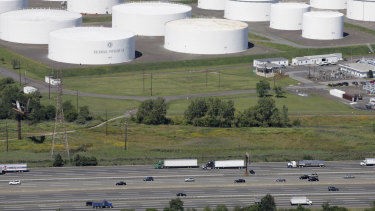 Oil storage tanks owned by the Colonial Pipeline Company in Linden, New Jersey, that transports fuels along the East Coast says it had to stop operations because it was the victim of a cyberattack. 