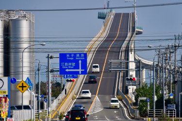 SHIMANE PREFECTURE, JAPAN - OCTOBER 10, 2017: Vehicles move along Eshima Ohashi rigid-frame bridge connecting Matsue, Shimane Prefecture, and Sakaiminato, Tottori Prefecture, over Lake Nakaumi. Yuri Smityuk/TASS (Photo by Yuri SmityukTASS via Getty Images) Getty image for Traveller. Single use only.